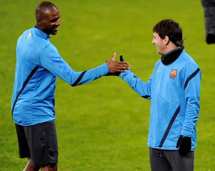 Abidal y Messi