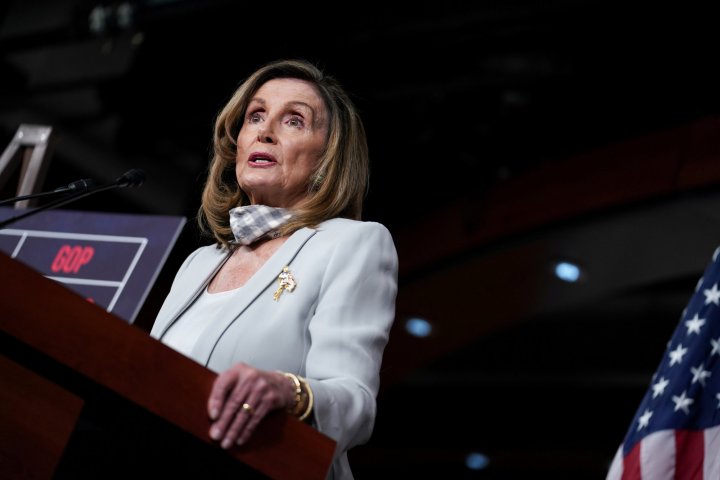 U.S. House Speaker Nancy Pelosi (D-CA) speaks about stalled congressional talks with the Trump administration on the latest coronavirus relief during her weekly news conference on Capitol Hill in Washington, U.S., August 13, 2020. REUTERS/Sarah Silbiger