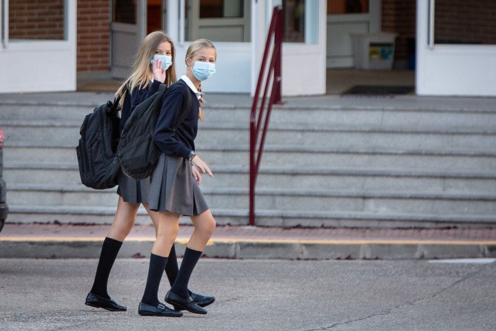 Crown Princess Leonor of Spain (R) and Princess Sofia of Spain (L) arrive at the 'Santa Maria de los Rosales' School on the first day of school on September 11, 2020 in Madrid, Spain. (Photo by Paolo Blocco/WireImage)