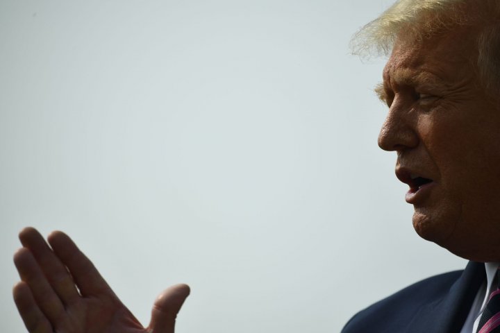 US President Donald Trump speaks to the press on the tarmac as he arrives at Sacramento McClellan Airport in McClellan Park, California on September 14, 2020.