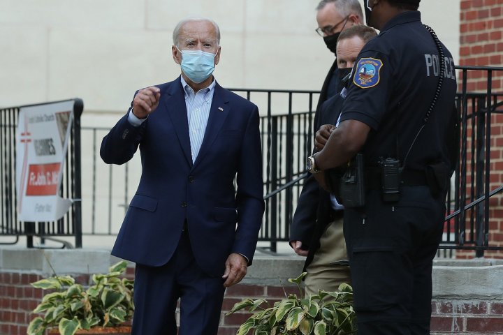 Democratic presidential nominee Joe Biden wears a mask to reduce exposure to the coronavirus (COVID-19) as he leaves mass at St. Joseph's Church October 03, 2020 in Wilmington, Delaware. Biden attended Saturday evening services at the church in downtown Wilmington. Chip Somodevilla/Getty Images/AFP